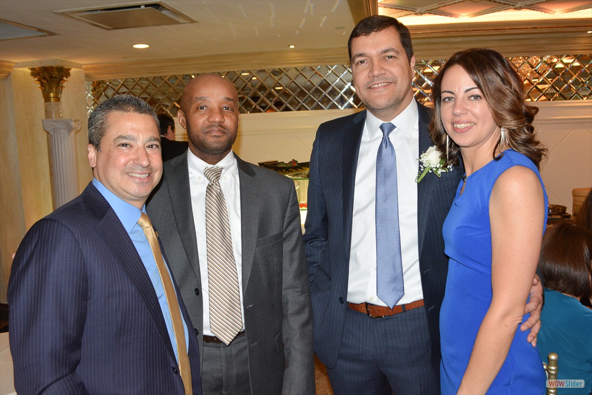 Past Chapter President Steve Fusco (l.), Incoming President Adriano Duarte (2nd r.) and wife Monica are joined by a Chapter Member.