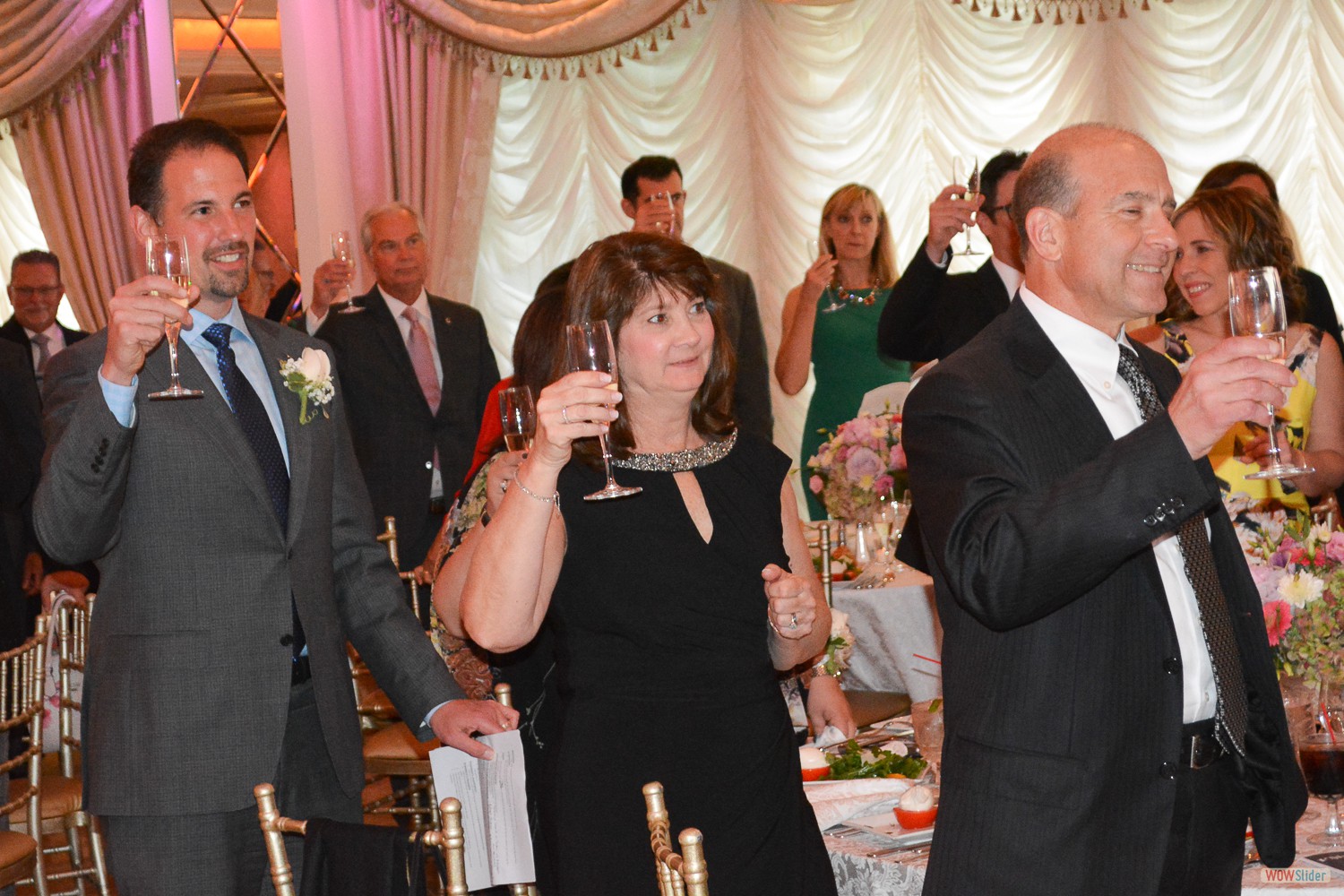 Members offer a toast to the incoming Chapter Officers