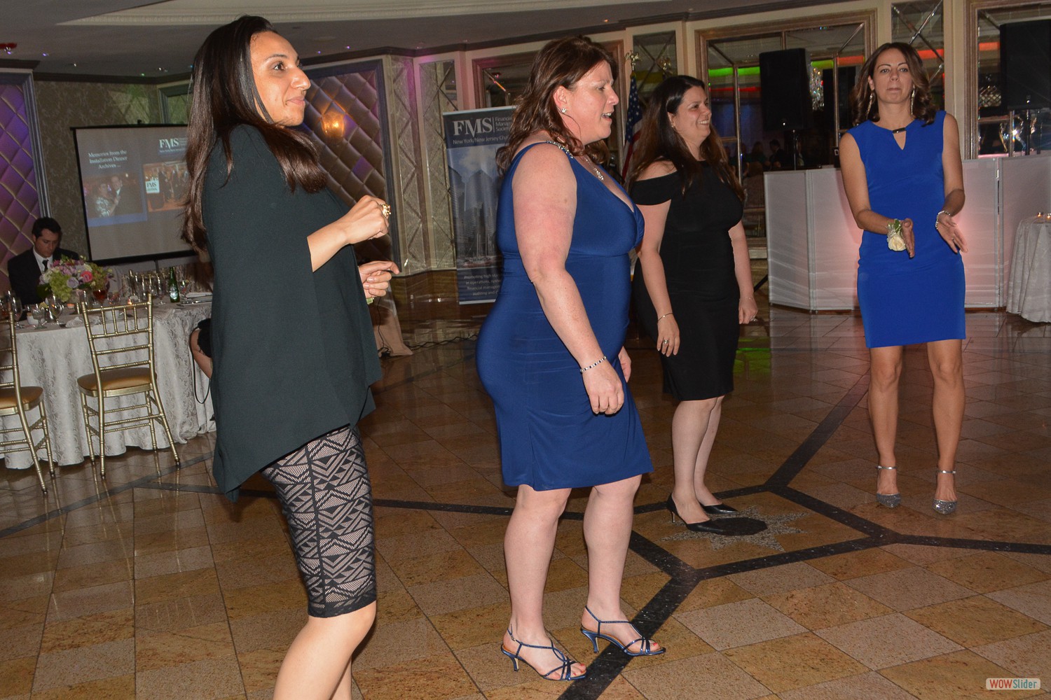 Newly installed Chapter Treasurer Suny Mellawa (l.) takes to the dance floor 