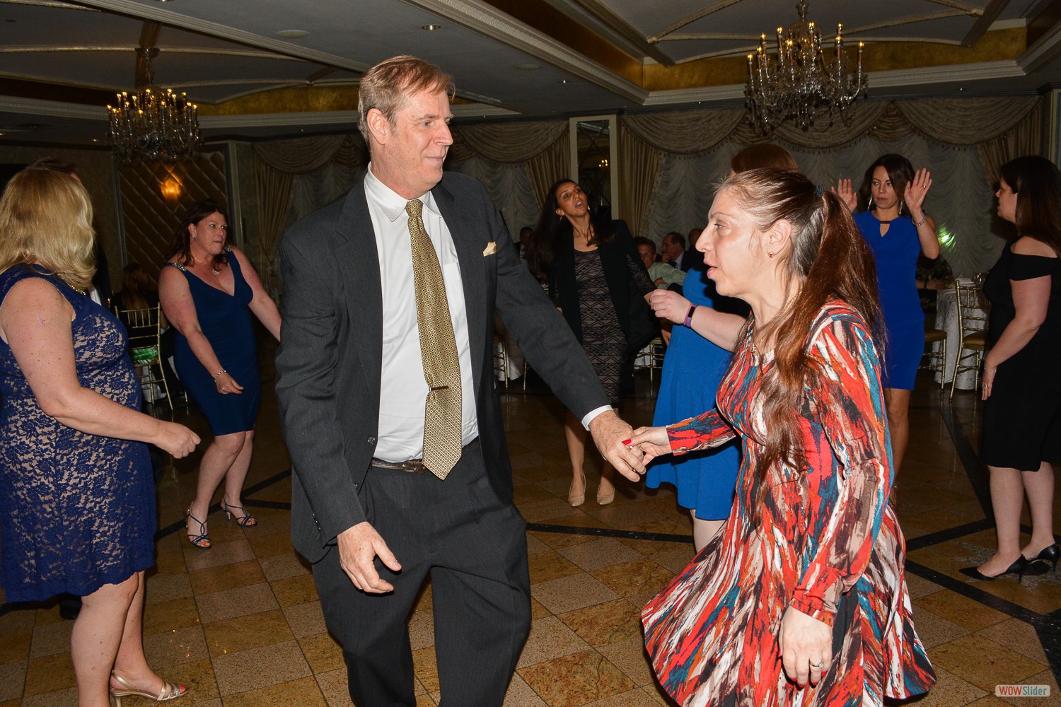 Chapter Past President Andriette Matthews joins spouse Paul for a dance.
