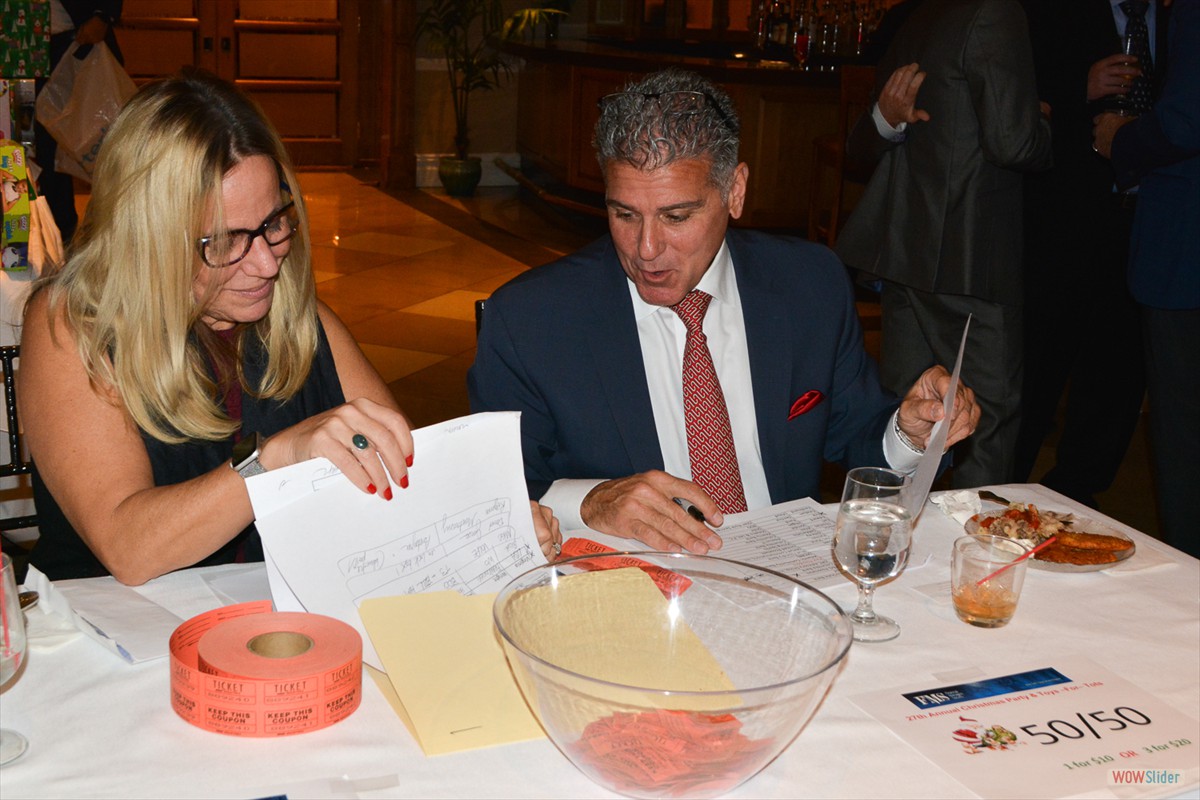 Chapter Vice President Amy Wheatley and Secretary Angelo DiCarlo 'work' the regsitration desk. 