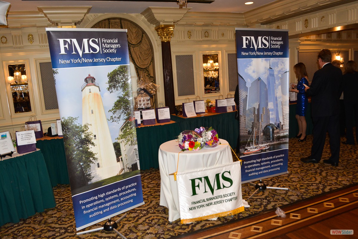 The FMS Chapter Banners with bouquets of flowers greet Casino Night gamblers!
