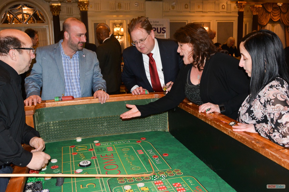 Past Chapter President Cindi Rand explains to the dealer that she has had enough of this round of craps!