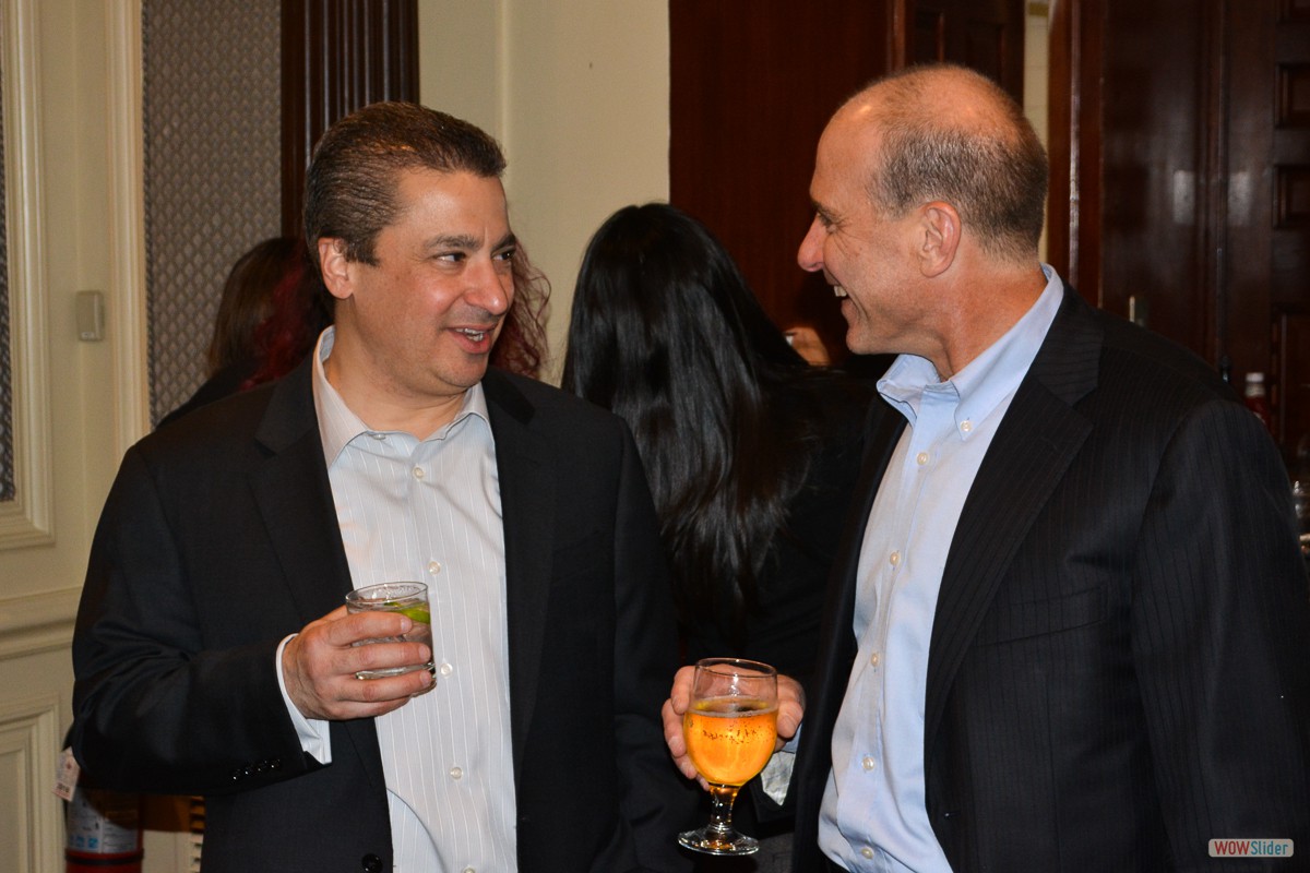 Past Chapter Presidents Steve Fusco (l.) and Joe Coccaro enjoy a round of drinks on the house!