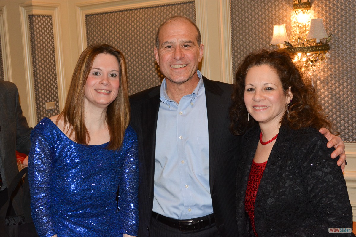 Past Chapter President Joe Coccaro (c.) joins Grace and Erica.