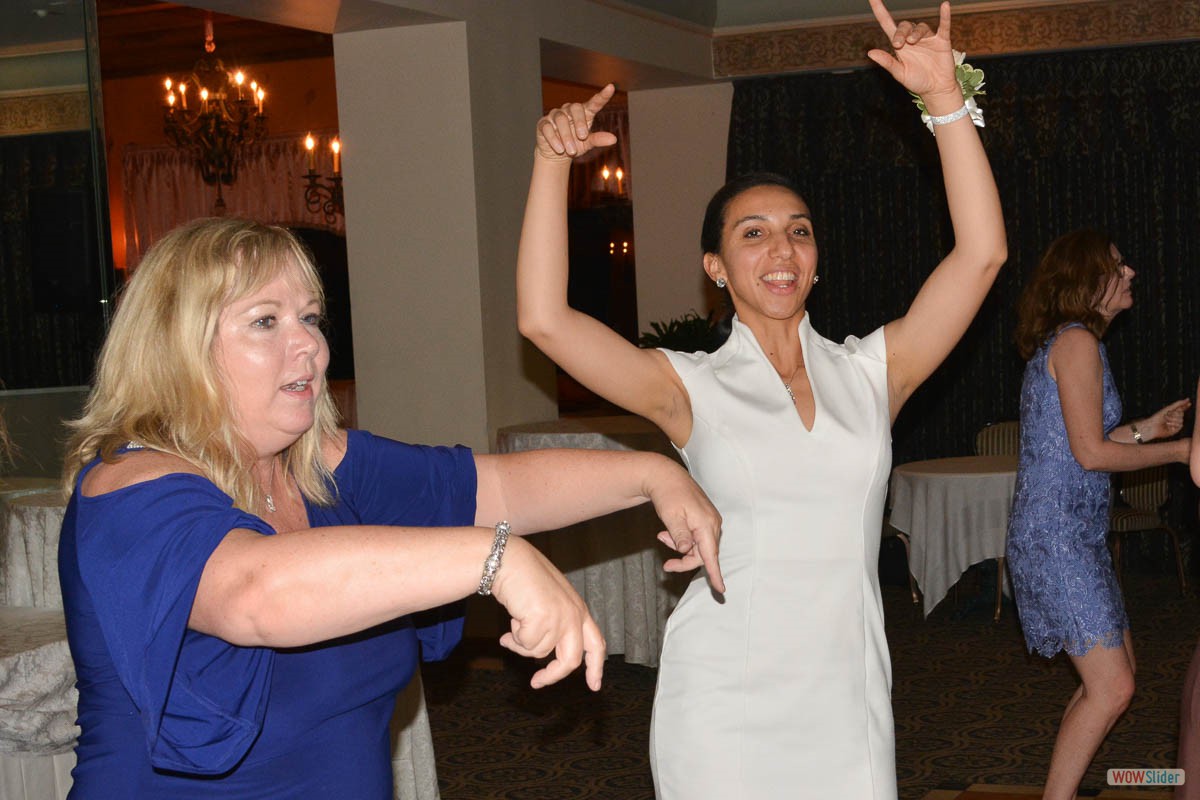 Newly installed Chapter Secretary Suny Mellawa (r.) enjoys the dance floor with Maureen.