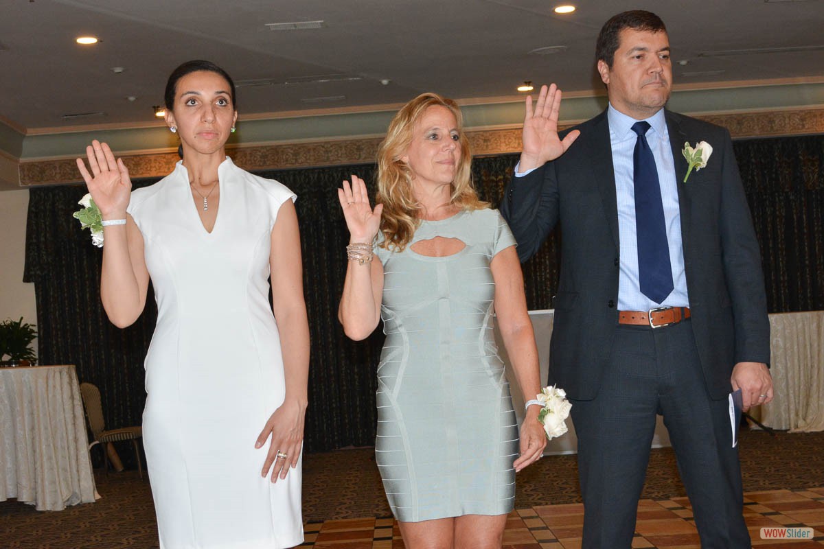 The incoming slate of Chapter Officers take the oath of office (l.-r.) Suny Mellawa (Secretary), Amy Wheatley (Treasurer), and Adriano Duarte (Vice-President).