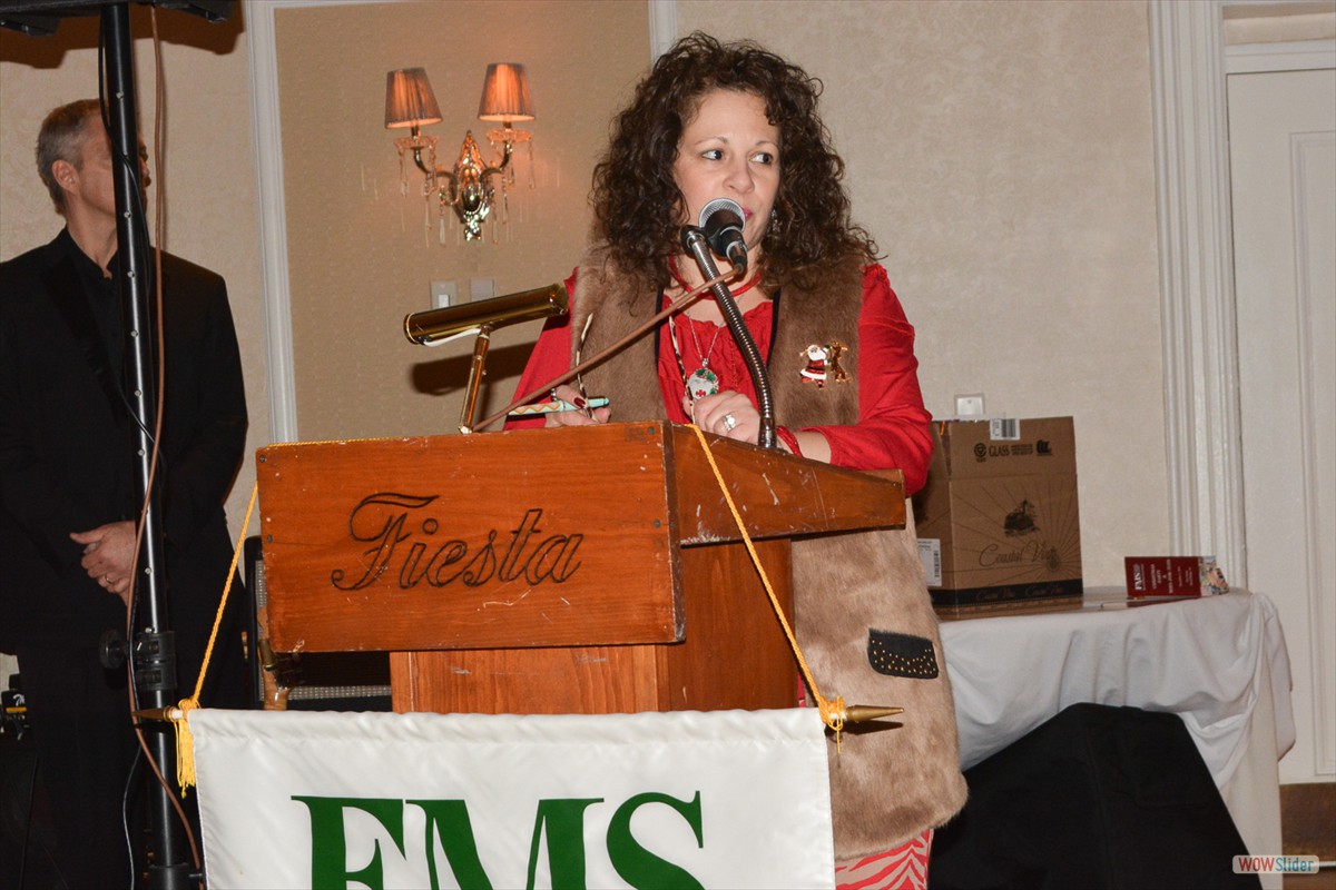 Chapter Past President Grace Cruz-Beyer welcomes the large contingent of Chapter Members to this year’s event and offered special thanks to all who contributed to the Toys-for-Tots program.