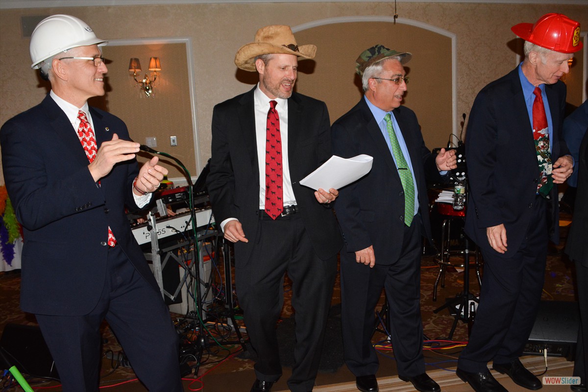 Erik Rand (2nd l.) and Chapter Past Presidents John Klimowich, Fred Viaud and Kevin O'Connell prepare for an electric version of 'YMCA'