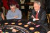 Keith Van Saders (r.) plays a round of blackjack.