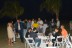 Members and guests enjoy the bonfire reception on the beach.